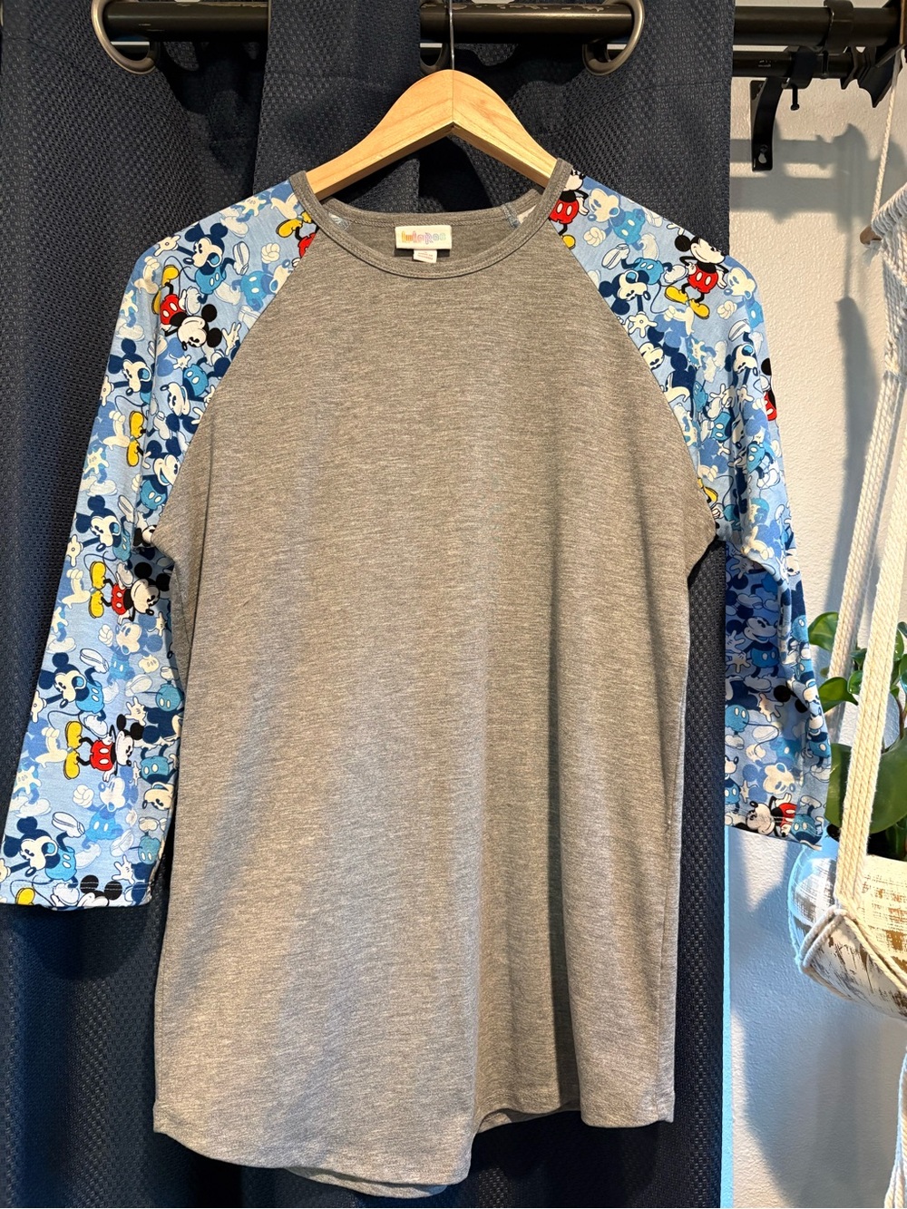 LuLaRoe Disney Collection Grey Raglan Top with Blue Character Print Sleeves